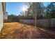 Private backyard with wooden fence and grassy area at 4976 Centennial Hill Walk Nw Dr, Acworth, GA 30102