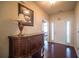 Bright entryway with hardwood floors and a console table at 4976 Centennial Hill Walk Nw Dr, Acworth, GA 30102