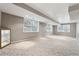 Spacious basement featuring neutral walls, carpet flooring and natural light from several windows at 650 Hunterhill Ct, Roswell, GA 30075