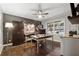 Home office with hardwood floors, natural light, and a ceiling fan at 650 Hunterhill Ct, Roswell, GA 30075