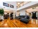Open floor plan with hardwood floors connects the living room, dining area, and staircase at 1045 Paper Creek Dr, Lawrenceville, GA 30046