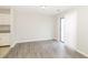 Bright dining area features gray flooring, white walls, and a sliding door to backyard at 20 Oak Wood Ln, Covington, GA 30016