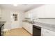 Kitchen with white cabinets, granite counters, and stainless steel appliances at 20 Oak Wood Ln, Covington, GA 30016