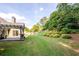 Spacious backyard with a pergola and patio at 305 Mogie Ln, Acworth, GA 30102