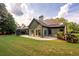 House's backyard, patio, and pergola at 305 Mogie Ln, Acworth, GA 30102