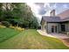 Green backyard, home with large patio at 305 Mogie Ln, Acworth, GA 30102
