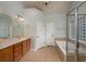 Elegant bathroom with double sinks, garden tub, and separate shower at 305 Mogie Ln, Acworth, GA 30102