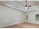 Primary bedroom with high ceilings and ceiling fan at 305 Mogie Ln, Acworth, GA 30102