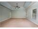 Large bedroom with neutral walls and carpet at 305 Mogie Ln, Acworth, GA 30102