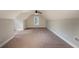 Spacious bedroom with vaulted ceilings and carpet flooring at 305 Mogie Ln, Acworth, GA 30102