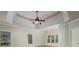 Spacious bedroom with high ceilings and a ceiling fan at 305 Mogie Ln, Acworth, GA 30102