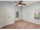 Bright bedroom with neutral walls and carpet flooring at 305 Mogie Ln, Acworth, GA 30102