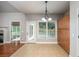 Breakfast room with tile floors and view of backyard at 305 Mogie Ln, Acworth, GA 30102