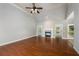 Spacious living room with hardwood floors, fireplace and access to backyard at 305 Mogie Ln, Acworth, GA 30102