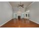 Spacious living room with hardwood floors, fireplace and backyard access at 305 Mogie Ln, Acworth, GA 30102