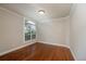 Bright office with hardwood floors and an arched window at 305 Mogie Ln, Acworth, GA 30102