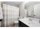 Neutral toned bathroom with shower and vanity. A serene and functional space at 5800 Oakdale Se Rd # 165, Mableton, GA 30126
