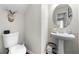 Elegant half bathroom with a pedestal sink and modern fixtures at 5800 Oakdale Se Rd # 165, Mableton, GA 30126