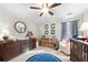Nautical themed Bedroom boasts a dresser, crib, rocker, and whimsical decor at 5800 Oakdale Se Rd # 165, Mableton, GA 30126