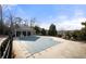 Community pool area, enclosed with a fence and trees around for residents to enjoy swimming at 5800 Oakdale Se Rd # 165, Mableton, GA 30126