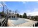 Community pool area, enclosed with a fence for residents to enjoy swimming and other community activities at 5800 Oakdale Se Rd # 165, Mableton, GA 30126