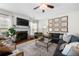 Cozy living room featuring a fireplace, plush seating, stylish decor, and a warm, inviting atmosphere at 5800 Oakdale Se Rd # 165, Mableton, GA 30126