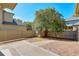Fenced backyard with patio and mature tree at 2005 Heathermere Way, Roswell, GA 30075