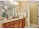 Well-appointed bathroom with granite vanity and walk-in shower at 2005 Heathermere Way, Roswell, GA 30075