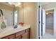 Bathroom with vanity, sink, and access to bedroom at 2005 Heathermere Way, Roswell, GA 30075