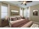 Spacious bedroom with large windows and neutral decor at 2005 Heathermere Way, Roswell, GA 30075