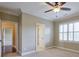 Spacious bedroom with neutral walls and carpet flooring at 2005 Heathermere Way, Roswell, GA 30075
