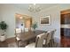 Elegant dining room with hardwood floors and built in cabinetry at 2005 Heathermere Way, Roswell, GA 30075
