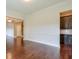 Formal dining room with hardwood floors and access to kitchen at 2005 Heathermere Way, Roswell, GA 30075