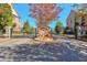 Gated community entrance with autumnal decorations at 2005 Heathermere Way, Roswell, GA 30075