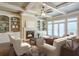Bright living room with hardwood floors, fireplace, and built-in shelving at 2005 Heathermere Way, Roswell, GA 30075