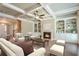 Living room with hardwood floors, built-in shelving and fireplace at 2005 Heathermere Way, Roswell, GA 30075