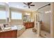 Luxurious bathroom with soaking tub, walk-in shower, and granite vanity at 2005 Heathermere Way, Roswell, GA 30075