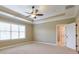 Bright main bedroom with a ceiling fan and large windows at 2005 Heathermere Way, Roswell, GA 30075