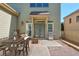 Cozy patio with seating for dining and relaxing near the house at 2005 Heathermere Way, Roswell, GA 30075