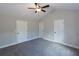 Bright bedroom with ceiling fan and double closets at 130 Eryn Ter, Covington, GA 30014