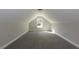 Spacious bonus room featuring a large window and carpet at 130 Eryn Ter, Covington, GA 30014