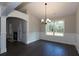 Formal dining room with hardwood floors and natural light at 130 Eryn Ter, Covington, GA 30014
