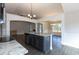 Island kitchen with granite and stainless steel appliances at 130 Eryn Ter, Covington, GA 30014
