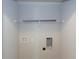 Simple laundry room with built-in shelving and hookups at 130 Eryn Ter, Covington, GA 30014