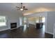 Open living room with fireplace and kitchen views at 130 Eryn Ter, Covington, GA 30014