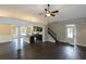 Open living space, kitchen, and staircase view at 130 Eryn Ter, Covington, GA 30014