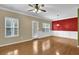 Bright living area features a ceiling fan and lots of natural light at 2935 Maple Park Pl # 49, Cumming, GA 30041