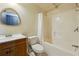 Bathroom featuring a vanity and mirror, toilet, and a shower and tub combination at 328 Thistlewood Run, Mcdonough, GA 30252