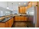 Spacious kitchen featuring stainless steel appliances, granite countertops, and ample cabinet space at 328 Thistlewood Run, Mcdonough, GA 30252