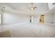 Spacious main bedroom with neutral carpet and ceiling fan at 328 Thistlewood Run, Mcdonough, GA 30252